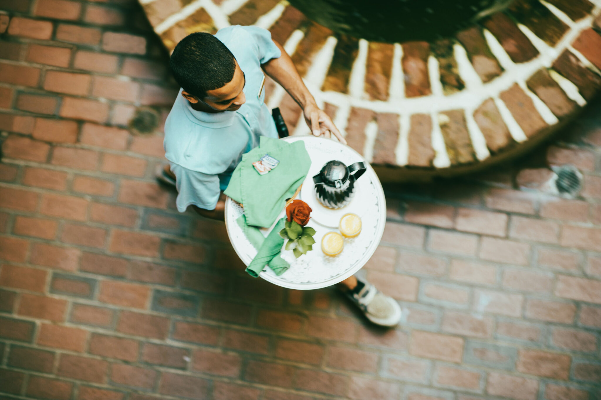 waiter servicing breakfast